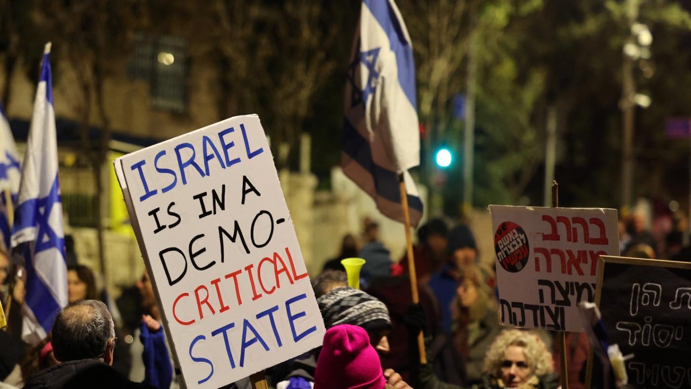 People across Israel protest defence minister’s firing